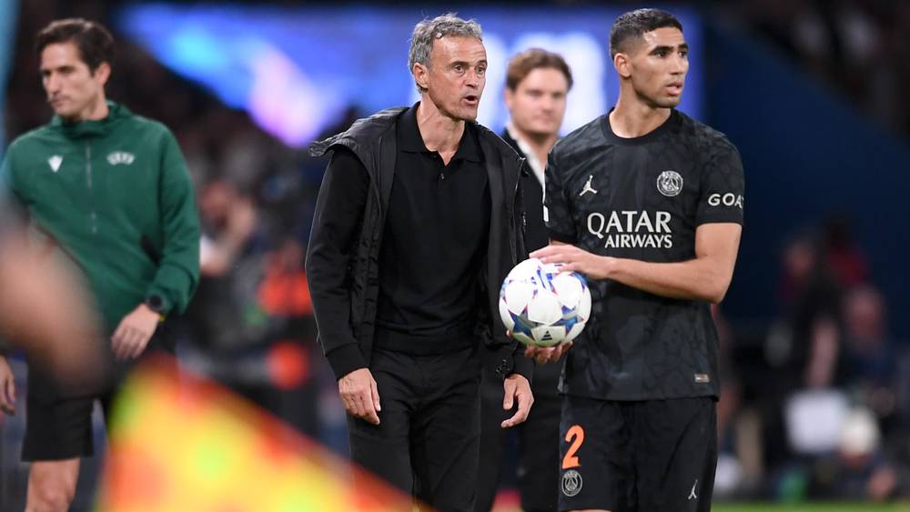 أشرف حكيمي ولويس إنريكي